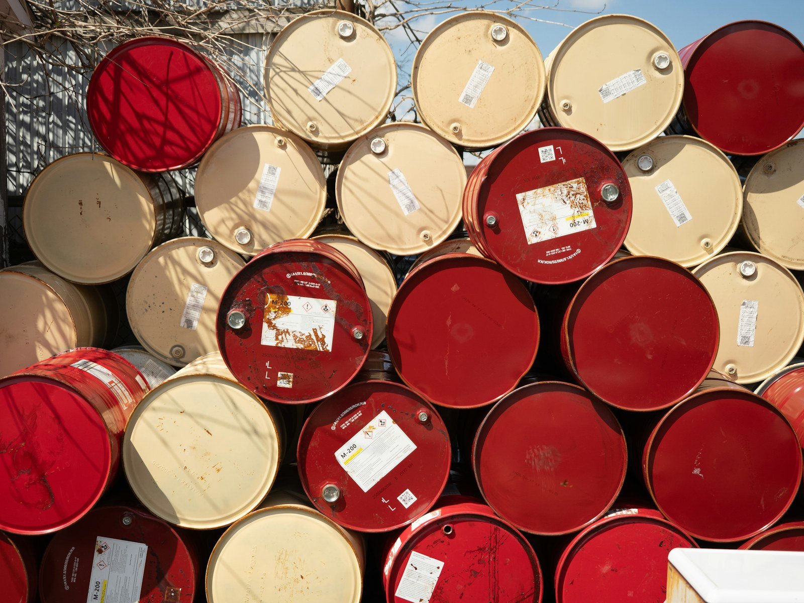 Industrial drums stored on warehouse pallets