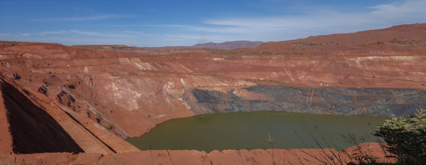 Open-pit mining site and mineral extraction